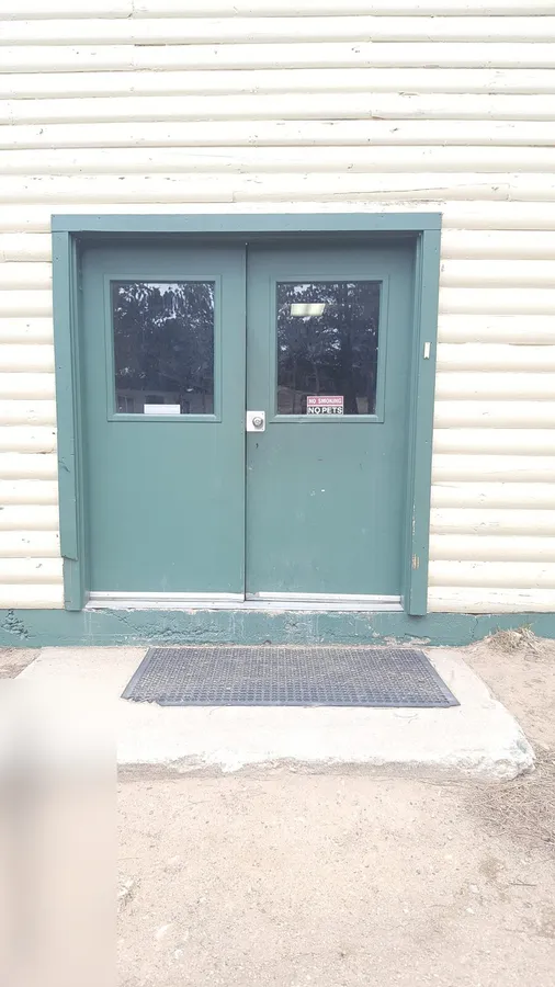 Old hollow metal door before replacement